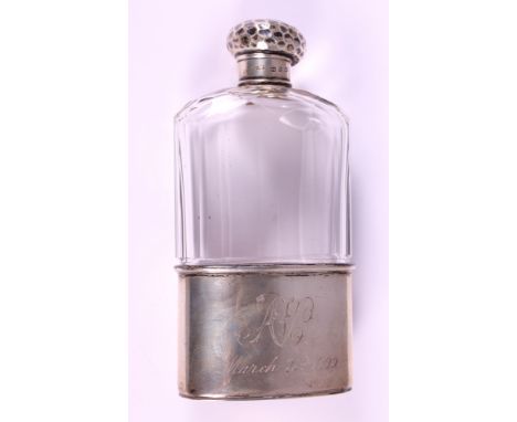 A glass pocket flask with silver lid and removable cup