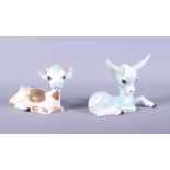A Studio Szeiler recumbent cow and a companion donkey, 7" long