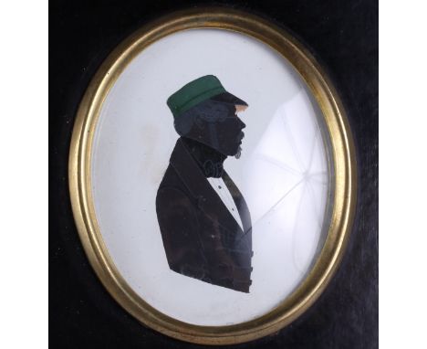 An early 19th century Continental portrait silhouette, "Herr Daub", 2 1/2" x 2 1/8", in ebonised frame