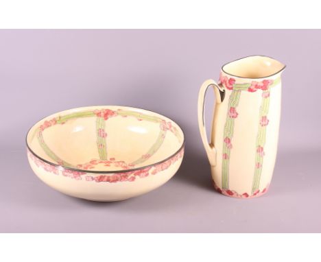 A Royal Doulton Art Nouveau designed toilet jug and basin (rim chipped to basin), jug 2" high