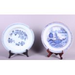 An 18th century Delftware plate with chinoiserie decoration, 12" dia (restored) and a similar dish