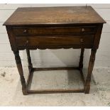 An oak cutlery table with drawers opening to felt lining (H77cm W68cm D40cm)