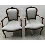 A pair of Louis style open arm chairs