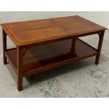 A hardwood Bradley two tier coffee table (H55cm W123cm D62cm)