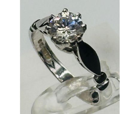 An 18ct white gold CZ ring approximate weight 3.7g and size O
