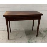 A Georgian style folding tea table with single long drawer and string inlay detail (H74cm W96cm