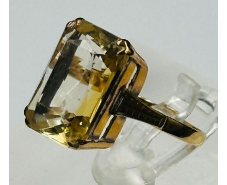 A 9ct gold citrine ring (14mm x 10mm stone size approximately) size K and weight 3.4g.