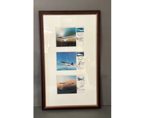 A framed selection of three Concorde First Day covers signed by Captain Mike Bannister, Brian Trubshaw and Barbara Harmer 
