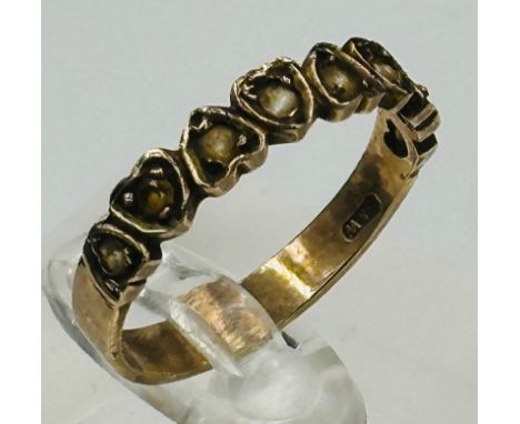 A 9ct gold heart themed ring, approximate size P and weight 2.2g