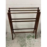A mahogany towel rail