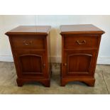 A pair of veneered single drawer bedside tables (H66cm W40cm D39cm)