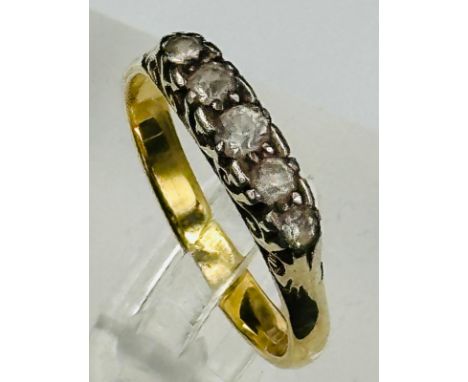 A five stone diamond ring, approximate weight 5.8g and size Q