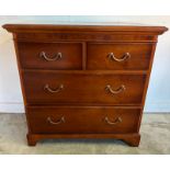 A mahogany veneer two over three chest of drawers (H89cm W91cm D49cm)