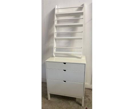A white contemporary chest of three graduating drawers and a matching four shelf wall hanging shelving unit (Chest H88cm W73c