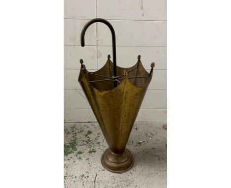 A brass stick stand in the shape of an umbrella 