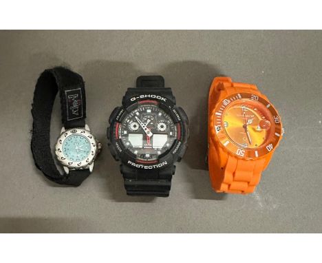 Three sports wristwatches, a Casio G Shock, an Animal and a Luxury Crystal 
