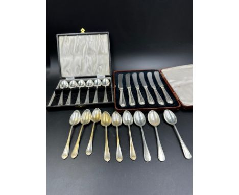 A selection of boxed and some loose quality silver plated flatware to include butter knives and coffee spoons 