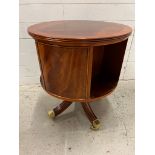 A Regency style revolving mahogany bookcase (H64cm Dia54cm)