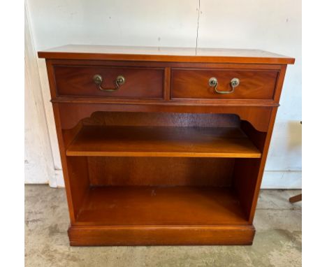 A two drawer veneered side cabinet with shelf under (H78cm W79cm D32cm)