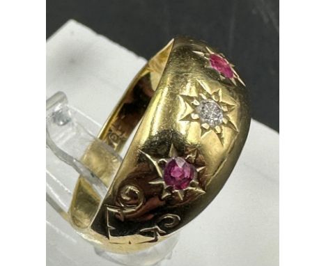 An 18ct gold ring with central diamond, approximate weight 2.6g and size K