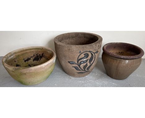 3 large terracotta garden planters. Large planter with black painted foliate design (cracked), together with a drip glazed po