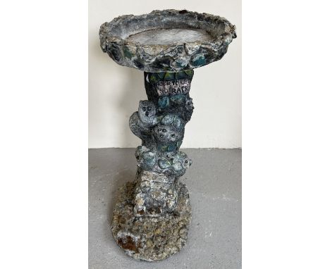 A modern 2 sectional garden bird bath with pedestal base modelled as a tree trunk with animals. With painted detail. Approx. 