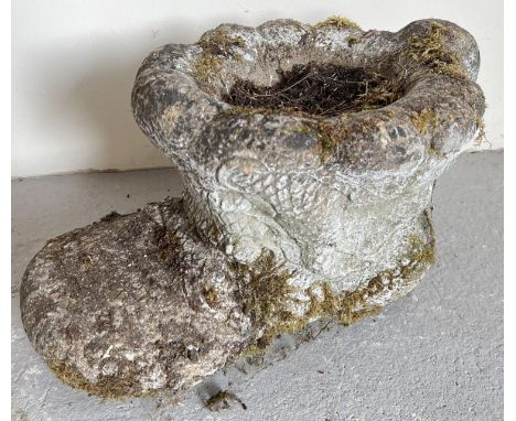 A vintage weathered concrete garden planter modelled as a boot. Approx. 24cm tall x 34cm long. 