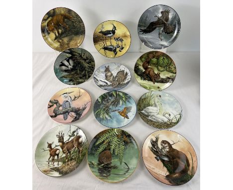 A complete set of 12 boxed Wedgwood ceramic collectors plates from 'The Water's Edge' series. 8" plates featuring the art of 