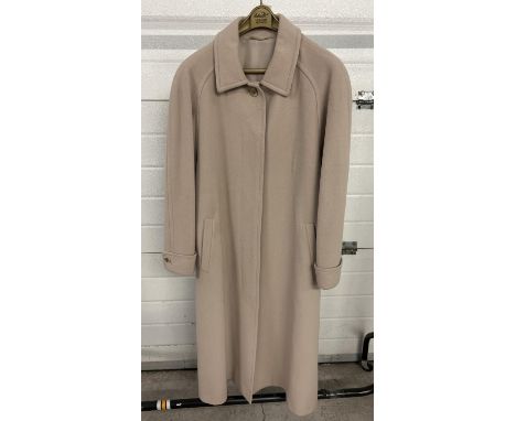 A vintage beige wool and cashmere full length coat with collar, front hidden button fastening and turn back cuffs. Size 12. 