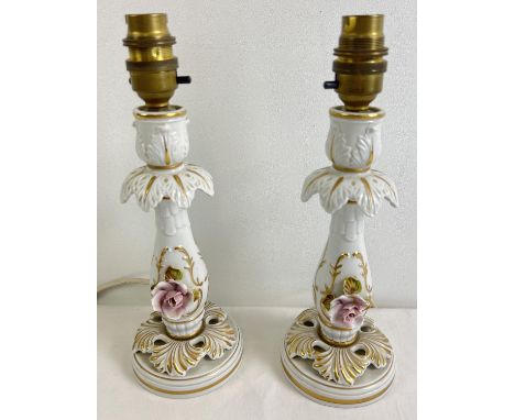 A pair of Capodimonte Italian ceramic lamp bases with hand painted gilding and floral embossed detail. Each approx. 26.5cm (t