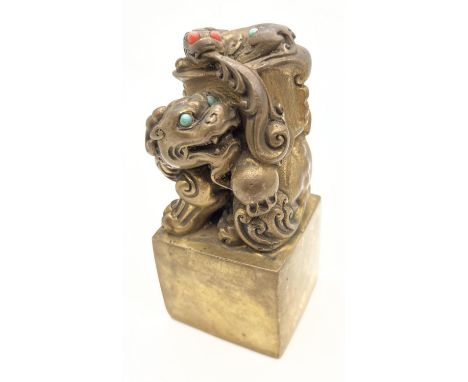 A gilt bronze Chinese seal with dragon &amp; lizard design finial and stone set detail. Approx. 12.5cm tall. 