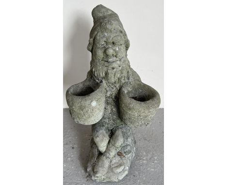 A concrete garden ornament/planter of a gnome holding 2 pots. Approx. 49cm tall. 