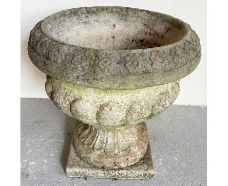 A Sandford Stone 2 sectional pedestal based garden planter of classical design. With floral design to rim. Approx. 36cm tall 