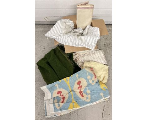 A box of assorted vintage textiles. To include vintage striped cotton and linen lining materials, a dark green wool door curt