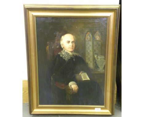 19TH CENTURY SCHOOL PORTRAIT OF A MAN SEATED THREE QUARTER LENGTH IN AN INTERIOR HOLDING A VOLUME OF SHAKESPEARE OIL ON CANVA