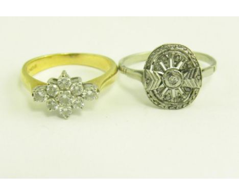 A DIAMOND CLUSTER RING IN 18CT GOLD AND ANOTHER DIAMOND CLUSTER RING IN WHITE METAL, 5.8G