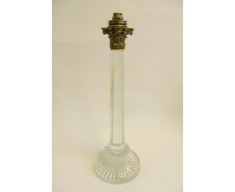 A GOOD QUALITY LATE VICTORIAN GLASS OIL LAMP ON STAR CUT FOOT WITH BRASS CORINTHIAN CAPITAL