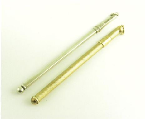 A 9CT GOLD SWIZZLE STICK, 6.2G AND A SILVER SWIZZLE STICK