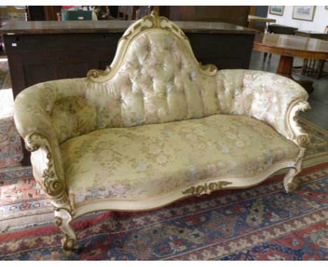 A CARVED AND CREAM AND GILT PAINTED ROCOCO REVIVAL SOFA 19TH CENTURY