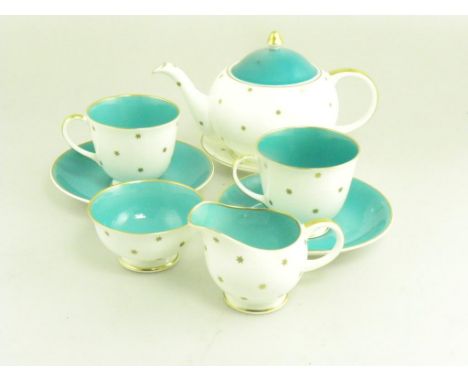 A SUSIE COOPER TEA SET FOR TWO, TEAPOT CRACKED