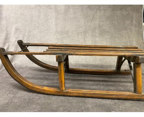 A vintage wooden sledge