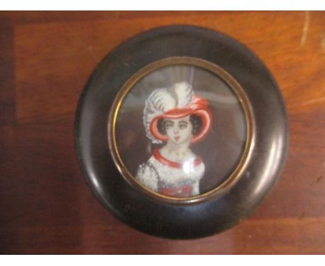 A 19th century tortoiseshell snuff box set with a portrait 