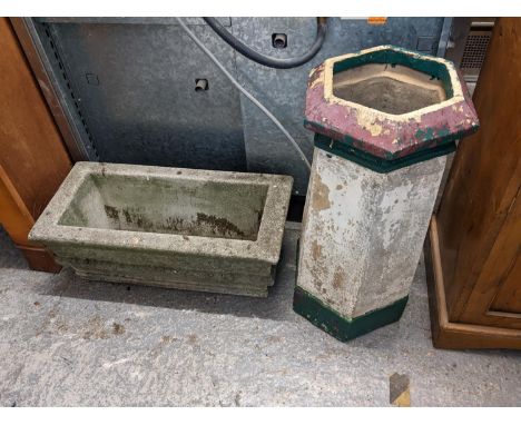 A Victorian painted chimney pot and a weathered cast stone garden planter trough 