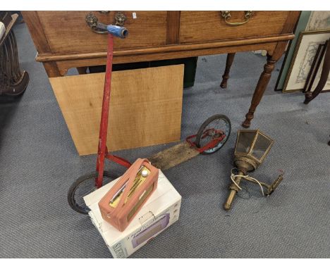 A brass exterior lamp, a vintage scooter and a Roberts radio 