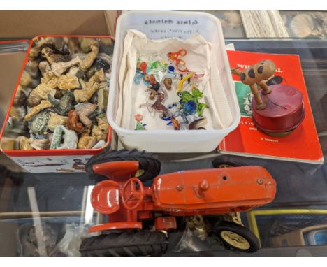 A lot to include a collection of Wade Whimsies and Minikins, glass lampwork animals, a Lesney diecast model of a Massey Fergu