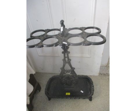 A reproduction Victorian style cast iron stick/umbrella stand 