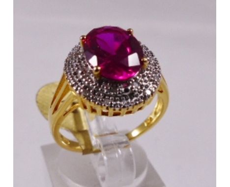 RUBY AND DIAMOND RING. Ruby and diamond ring on gilded silver, size P