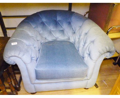 TUB CHAIR. Blue upholstered button back tub chair