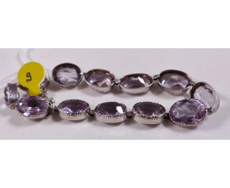 SILVER AMETHYST BRACELET. Sterling silver amethyst bracelet, approximately 36ct