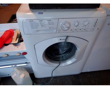 Hotpoint 7kg washing machine, model HU71451. All electrical items in this lot have been PAT tested for safety and have passed